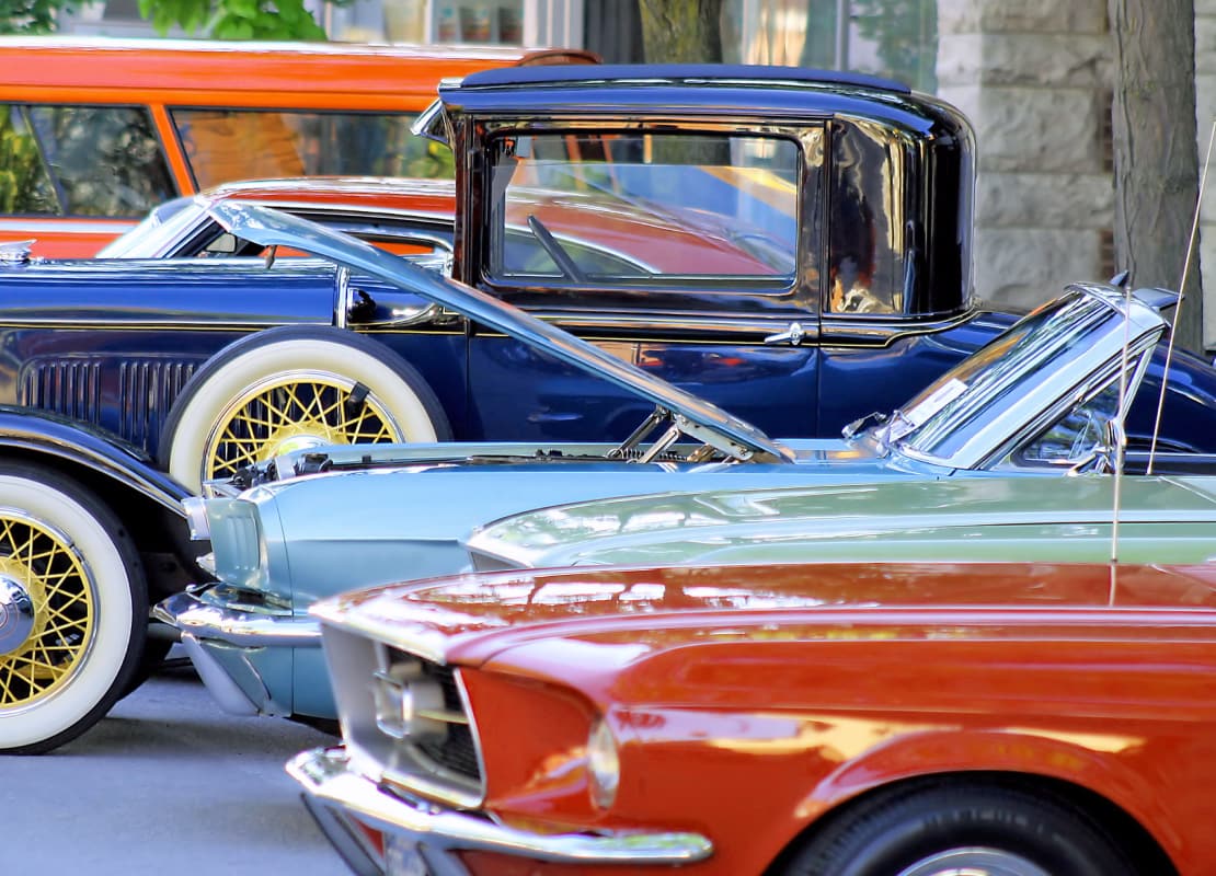 Classic cars are parked